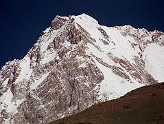 13 Nanga Parbat Close Up On Trek From Tarashing To Rupal Face Base Camp The trek from Tarashing climbs over the Tarashing Glacier with a view of the Rupal Village ahead. After passing the lush fields of Rupal Village, an excellent view of Nanga Parbat comes into view, with the Rupal Face to the left, the summit, and the East Face to the right.